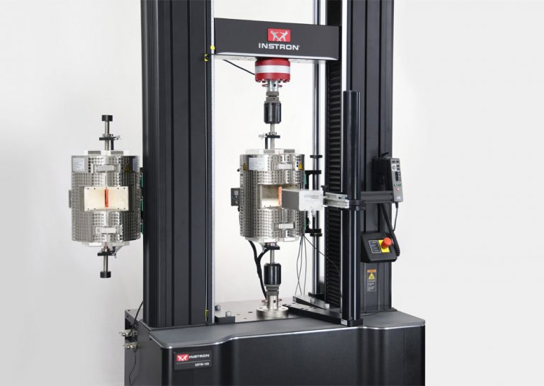 Instron 68FM-100 universal testing system with two high-temperature furnaces mounted on the frame for elevated temperature metals tensile testing.